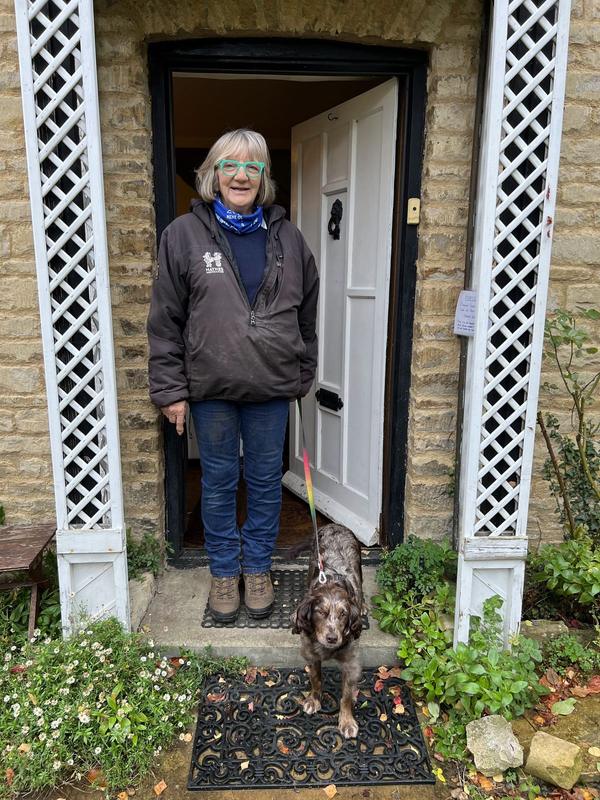 Cottage doorway framed by planting